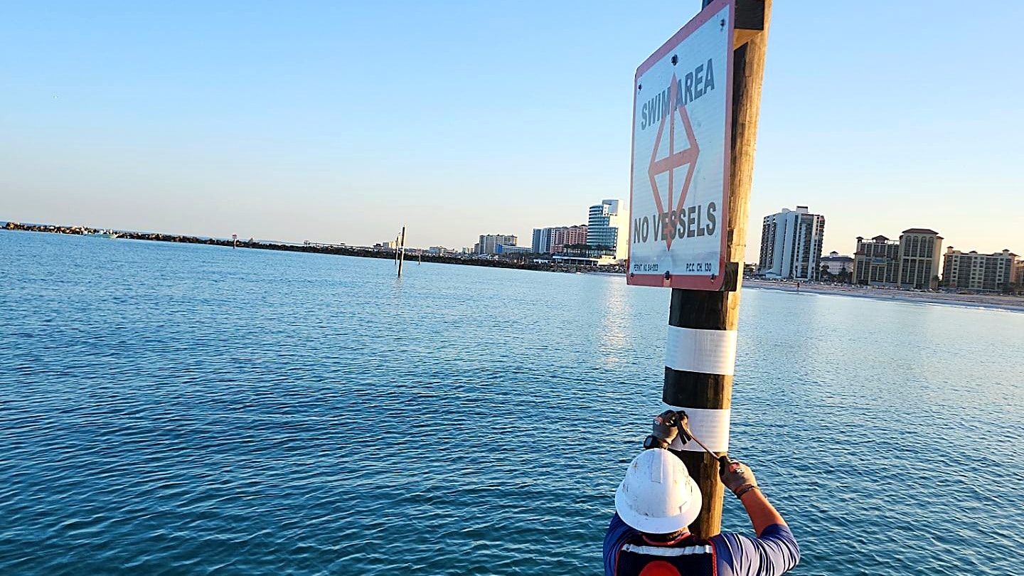 Wooden pier over calm coastal water Tampa Bay